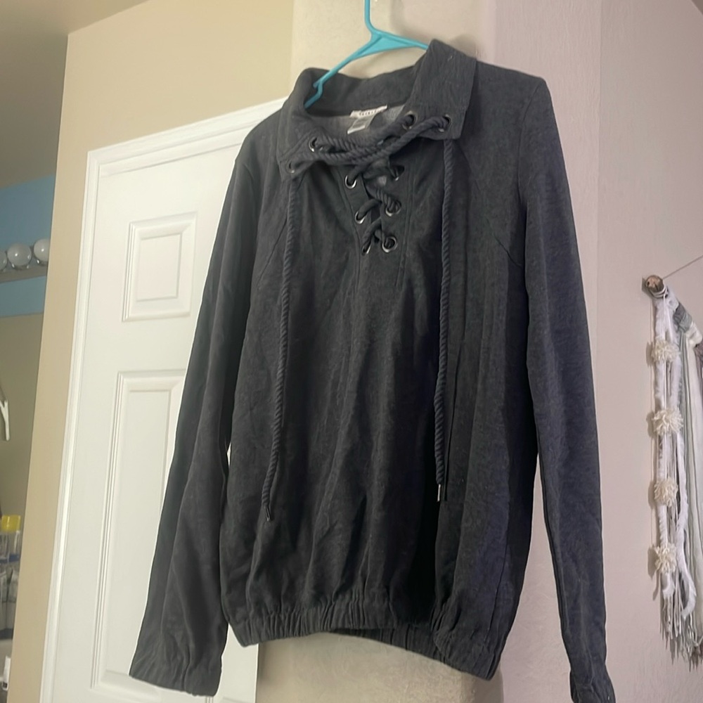 Gray long sleeve sweatshirt could be worn as loungewear or on the go